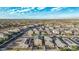 Aerial view of a neighborhood with many houses and solar panels at 30009 W Monterey Dr, Buckeye, AZ 85396