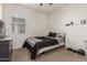 Bedroom with full bed, dresser and closet at 30009 W Monterey Dr, Buckeye, AZ 85396