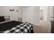 Bedroom with full bed, closet and access to hallway at 30009 W Monterey Dr, Buckeye, AZ 85396