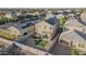 Aerial view showcasing a house with a backyard, solar panels, and a swimming pool at 30009 W Monterey Dr, Buckeye, AZ 85396