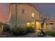 Home exterior and backyard with covered patio and basketball court at 30009 W Monterey Dr, Buckeye, AZ 85396