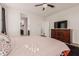 Large bedroom with a queen bed, dresser, and walk-in closet at 30009 W Monterey Dr, Buckeye, AZ 85396