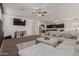 Spacious living room with sectional sofa and fireplace at 30009 W Monterey Dr, Buckeye, AZ 85396