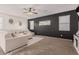 Spacious living room with neutral colored couch and accent pillows at 30009 W Monterey Dr, Buckeye, AZ 85396