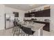 Modern kitchen with stainless steel appliances and granite countertops at 30009 W Monterey Dr, Buckeye, AZ 85396