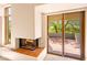 Private patio with seating area, accessed from bedroom at 10044 E Graythorn Dr, Scottsdale, AZ 85262