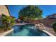 Enjoy this refreshing pool with a rock waterfall feature at 11033 E Rafael Ave, Mesa, AZ 85212