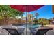 Inviting kidney-shaped pool with waterfall feature at 11033 E Rafael Ave, Mesa, AZ 85212