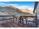 Deck with table and chairs, overlooking mountain landscape at 52320 W Foothill Trl, Maricopa, AZ 85139