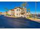 Building exterior showcasing a two-story building with landscaping and parking at 930 N Mesa Dr # 1039, Mesa, AZ 85201