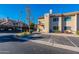 Building exterior showcasing the architectural style and landscaping at 930 N Mesa Dr # 1039, Mesa, AZ 85201