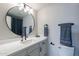 Updated bathroom with a vanity, toilet, and large mirror at 930 N Mesa Dr # 1039, Mesa, AZ 85201