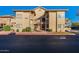 Exterior view of the building, showing the main entrance and landscaping at 930 N Mesa Dr # 1039, Mesa, AZ 85201