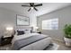 Main bedroom with ceiling fan and large window providing natural light at 930 N Mesa Dr # 1039, Mesa, AZ 85201