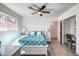 Bedroom with white bed frame and teal bedding, wood-look floors at 3135 N 34Th St, Phoenix, AZ 85018
