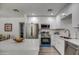 Modern kitchen with stainless steel appliances and white cabinets at 3135 N 34Th St, Phoenix, AZ 85018