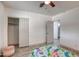 Bedroom with a twin-size bed and built-in closet at 3135 N 34Th St, Phoenix, AZ 85018
