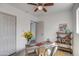 Home office featuring a wooden desk and shelving unit at 3135 N 34Th St, Phoenix, AZ 85018