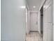 Clean hallway with light gray walls and wood-look floors at 3135 N 34Th St, Phoenix, AZ 85018