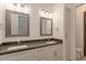 Modern bathroom with double vanity and dark countertops at 15528 E Chicory Dr, Fountain Hills, AZ 85268