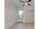 Bedroom with ceiling fan and large window at 15528 E Chicory Dr, Fountain Hills, AZ 85268