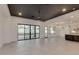 Bright and airy living room with large sliding glass doors and tile floors at 15528 E Chicory Dr, Fountain Hills, AZ 85268