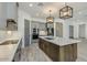 Modern kitchen with gray cabinets and a large island at 15528 E Chicory Dr, Fountain Hills, AZ 85268