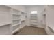 Large walk-in closet with ample shelving and hanging space at 15528 E Chicory Dr, Fountain Hills, AZ 85268
