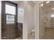 Bathroom with toilet, shower, and walk-in closet at 15528 E Chicory Dr, Fountain Hills, AZ 85268