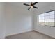 Bright bedroom featuring a large window and neutral color palette at 15528 E Chicory Dr, Fountain Hills, AZ 85268