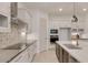 Sleek kitchen with contemporary cabinetry and a built-in cooktop at 15528 E Chicory Dr, Fountain Hills, AZ 85268