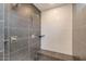 Large walk-in shower with gray and white tile and built-in seat at 15528 E Chicory Dr, Fountain Hills, AZ 85268