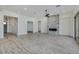 Open living area with wood-look floors and fireplace at 15528 E Chicory Dr, Fountain Hills, AZ 85268