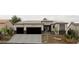Stunning curb appeal with three-car garage and desert landscaping at 15522 E Chicory Dr, Fountain Hills, AZ 85268
