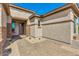 Craftsman style home with stone accents and a three-car garage at 15522 E Chicory Dr, Fountain Hills, AZ 85268