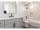 Bathroom with tub, toilet and gray vanity at 15522 E Chicory Dr, Fountain Hills, AZ 85268