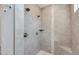 Large walk-in shower with dual shower heads and a built-in seat at 15522 E Chicory Dr, Fountain Hills, AZ 85268