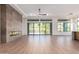 Spacious living room with fireplace and sliding glass doors to backyard at 15522 E Chicory Dr, Fountain Hills, AZ 85268