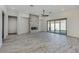 Bright living room with fireplace, sliding doors and wood-look tile flooring at 15522 E Chicory Dr, Fountain Hills, AZ 85268
