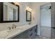 Modern bathroom with double vanity, gray cabinets, and quartz countertop at 15522 E Chicory Dr, Fountain Hills, AZ 85268