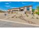 Beautiful home with a three-car garage and landscaped yard at 15522 E Chicory Dr, Fountain Hills, AZ 85268