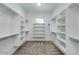 Spacious walk-in closet with ample shelving and hanging space at 15522 E Chicory Dr, Fountain Hills, AZ 85268