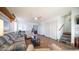 Living room with seating, a coffee table and access to a patio at 915 Mineshaft Dr, Apache Junction, AZ 85119