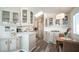 Kitchen features a breakfast nook and updated flooring at 915 Mineshaft Dr, Apache Junction, AZ 85119