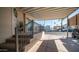 Stairs leading up to covered patio with metal railing at 915 Mineshaft Dr, Apache Junction, AZ 85119