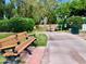 Relaxing community path with bench and landscaping at 915 Mineshaft Dr, Apache Junction, AZ 85119