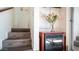 Stairs leading upstairs with an electric fireplace at 915 Mineshaft Dr, Apache Junction, AZ 85119