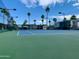 Well-maintained tennis court with surrounding fence at 915 Mineshaft Dr, Apache Junction, AZ 85119