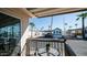 Covered patio with table, chairs, and view of community at 915 Mineshaft Dr, Apache Junction, AZ 85119