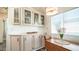 Kitchen features a built-in dining area with ample storage at 915 Mineshaft Dr, Apache Junction, AZ 85119